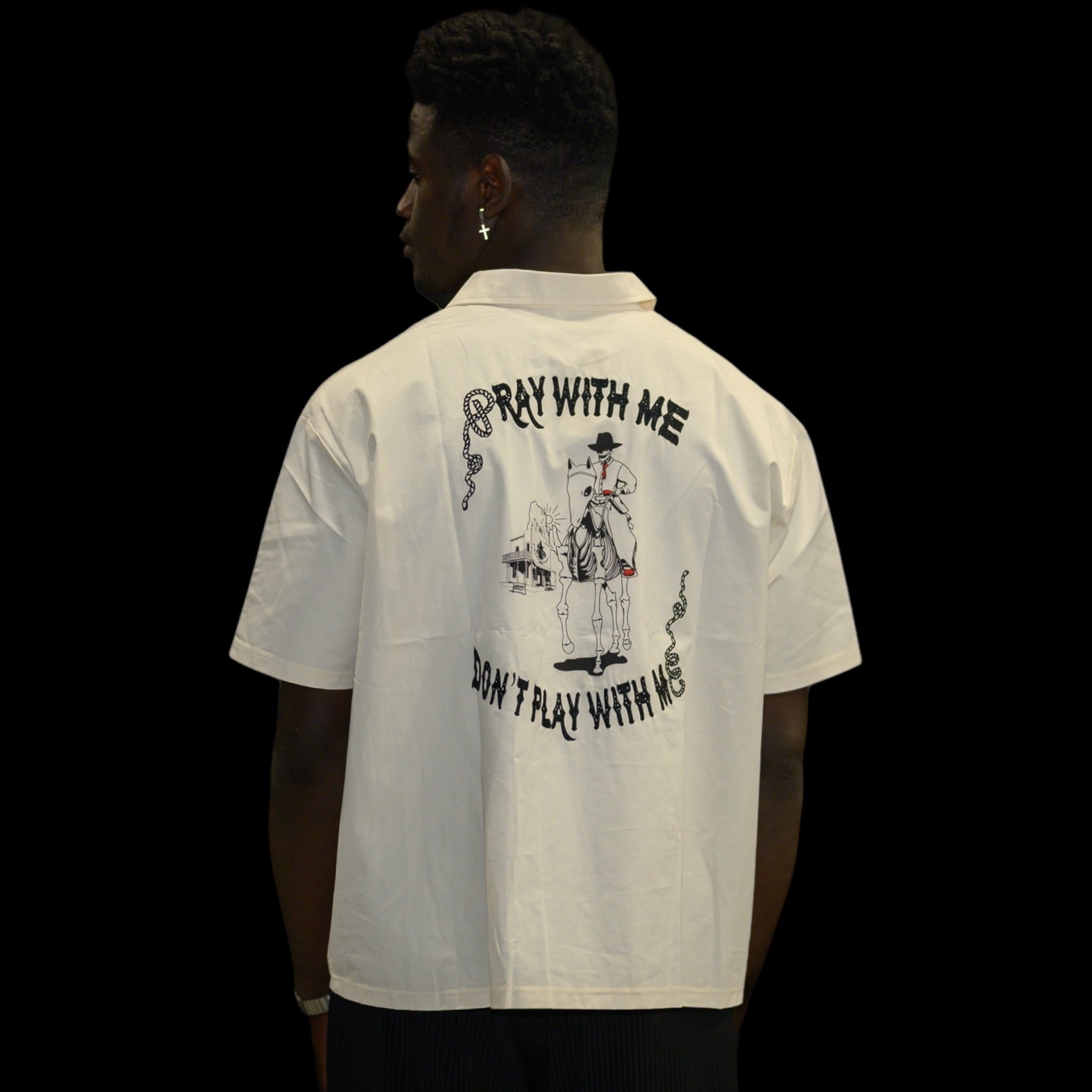 Divine Warning 01 Creme detail — stitched patches and engraved S2S zipper hardware Sinners2Saints